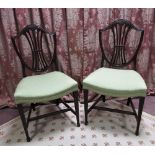 Pair of Edwardian Hepplewhite Revival mahogany dining chairs with wheat ear carved serpentine top