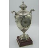 Late Victorian hallmarked Sterling silver mantel time piece, two handled urn shaped part lobed