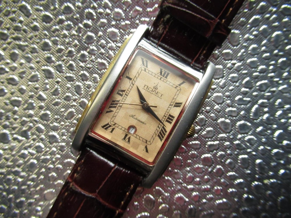 As new Poljot International automatic wristwatch with date, rectangular stainless steel and gold