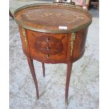 C20th French inlaid walnut side table with galleried oval top, bank of three drawers on slender