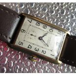 JW Benson, London 1930's 9ct gold cased hand wound wristwatch, rectangular gold case with hinged