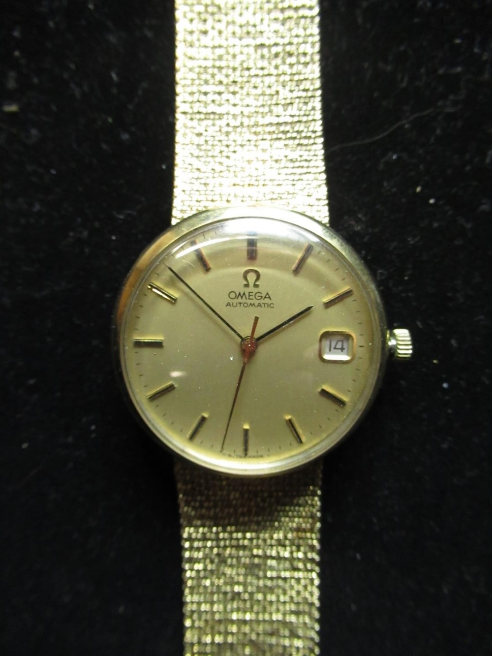 Omega automatic 9ct gold cased wrist watch with date, two piece gold case on hallmarked Milanese