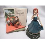 Two Cavendish Figurines Ltd. figures of Anne of Green Gables, one featuring horse and carriage and