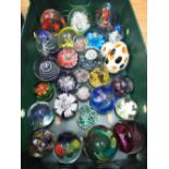 Large collection of assorted glass paperweights, including one by Mdina, another by Caithness (
