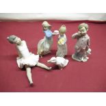 Selection of Lladro and Nao figurines including 4841 Valencian girl, Puppy's Birthday etc (5)
