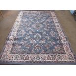 C20th acrylic grey ground rug, traditional pattern with floral pattern centre and floral pattern