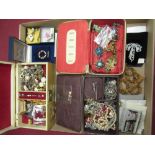 Large collection of costume jewellery including brooches, beads, rings, musical jewellery box, etc