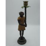 Painted bronze candlestick in the form of monkey supporting branch, with urn sconce, H37cm