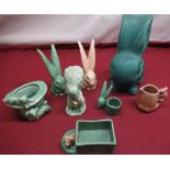 Large Sylvac green rabbit, two smaller similar rabbits and a collection of other Sylvac figurines,