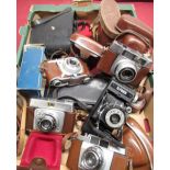 Selection of cameras and binoculars to include Cadet 8x30 binos, Japanese 8x40, Kodak retinette