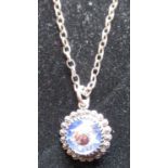 Charles Horner circular glass lady bird pendant in decorative hallmarked Sterling silver mount D1.