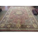 Late C20th Khorsabad traditional pattern wool rug, brick red ground with central floral medallion