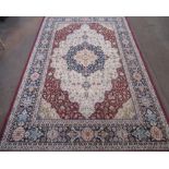 C20th Axminister Ahar Heritz traditional pattern rug, central blue and beige medallion surrounded by