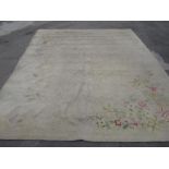 C20th Indian wool rug, beige ground with floral pattern offset corners, L391cm W300cm