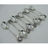 Set of nine mid C20th hallmarked silver and enamel teaspoons for the No. 3 District Rotary in