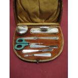 1920's manicure set in fitted case, with hallmarked silver fittings and handles, Birmingham 1922,