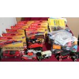 Collection of plastic and diecast model vehicles including: trains, boxed Ferrari F30, and other
