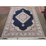 Late C20th traditional pattern silk style rug, beige floral pattern ground with matching centre