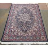 Late C20th Italian Karadagh traditional pattern, navy blue ground wool and silk rug, 170cm x 245cm