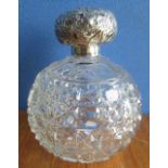 Victorian cut glass scent bottle with repousse decorated hallmarked Sterling silver mounts, makers