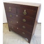 Regency mahogany chest, with boxwood strung frieze above two short and three long graduated