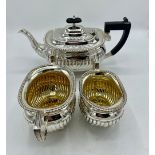 Geo.V hallmarked Sterling silver two handled sugar bowl and milk jug with lobed body, angular hndles