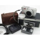Leica D-Lux 3 digital camera in silver finish with Lecia fitted leather case, charger and four spare