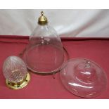 David Hall Collection - Glass storm lantern of typical tapering form with brass finial, H32cm, a