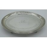 Geo.III hallmarked Sterling silver oval teapot stand with bright cut and monogramed decoration on