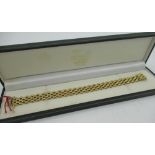 9ct yellow gold five row panther bracelet with concealed box clasp and safety catch, stamped 375,