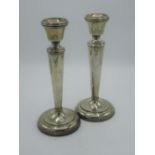 Pair of C19th hallmarked Sterling silver candlesticks with beaded sconces on tapering columns and