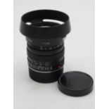Leica Summilux 50mm F1.4 M fit lens with associated Leica lens hood