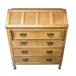 Sid Pollard of Thirsk - Oak bureau, adzed four panel front, above four long drawers with cast iron