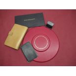 Smythson leather accessories - Red circular seating chart D30cm, blue Engagements book, & stamp box,
