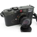 Leica M6 in black finish with Leica Elmar 50mm F2.8 collapsible lens, camera serial no. 1704853