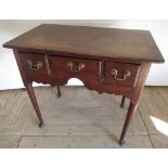 Geo. III oak lowboy, overhanging moulded top above two deep and one shallow drawers, with shaped