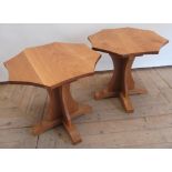 Sid Pollard of Thirsk - Pair of oak occasional tables, the shaped octagonal tops on cruciform