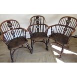 Set of three early C19th yew and elm wood low back Windsor armchairs, with fir tree splats and