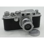 Leica IIIF 35mm rangefinder camera with Leitz Elmar 5cm 3.5 collapsible lens in chrome finish