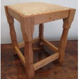 Sid Pollard of Thirsk - Oak square stool, brass nail upholstered top on octagonal baluster
