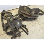 Collection of leather LNER heavy horse tack comprising bridle with blinkers, iron chain work, etc