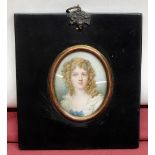 English School (C19th): Miniature head and shoulder portrait of a young lady, in lace trimmed dress,