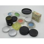 Selection of various Leica push on filters, screw in filters, lens caps, back caps, etc