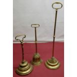 Beal House Collection - Three Victorian cast iron and brass door porters, with loop handles, slender