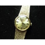 Ladies Tudor Royal 9ct gold cased wristwatch on matching integral bark effect bracelet, clasp end