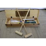 Jaques Croquet set, with four Corrigrip mallets, hoops, balls etc in pine case