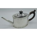 Geo.III hallmarked Sterling silver oval teapot with ebonised handle and finial, bright cut