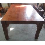 Large Victorian pitch pine kitchen table, rounded rectangular top with shaped frieze on faceted