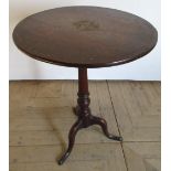 Geo. III oak tripod tea table, circular scratch carved tilt top on vase turned column support and