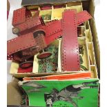 Large quantity of vintage Meccano in divided boxes, with instruction sets